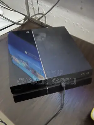 Ps4 Console With One Pad and Games
