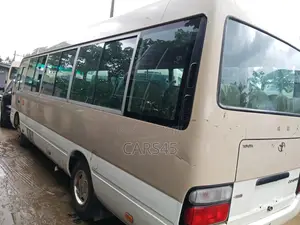 Toyota Coaster 2018 Gold