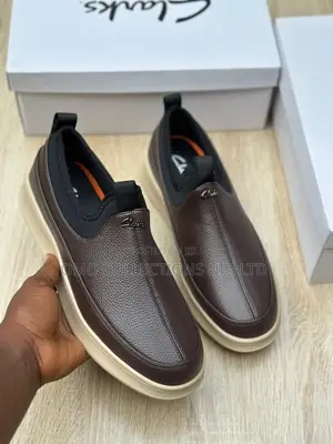 Fully Boxed Clarks Men’s Slip-on Shoes – Available in Black Brown
