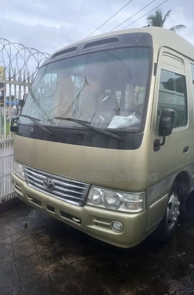 Toyota Coaster 2012 Gold