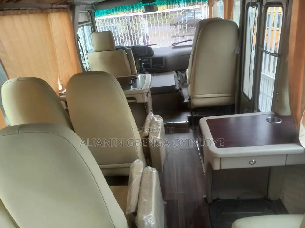 Toyota Coaster 2012 Gold
