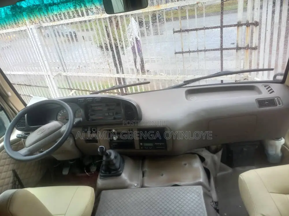 Toyota Coaster 2012 Gold