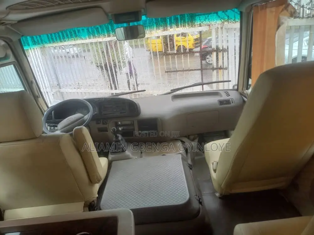 Toyota Coaster 2012 Gold