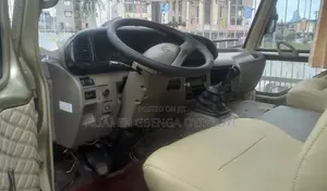 Toyota Coaster 2012 Gold