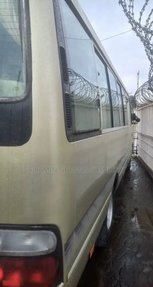 Toyota Coaster 2012 Gold