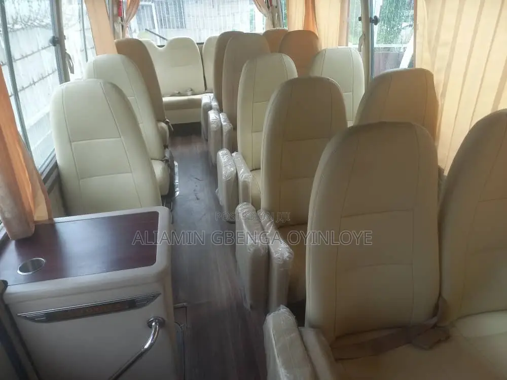 Toyota Coaster 2012 Gold