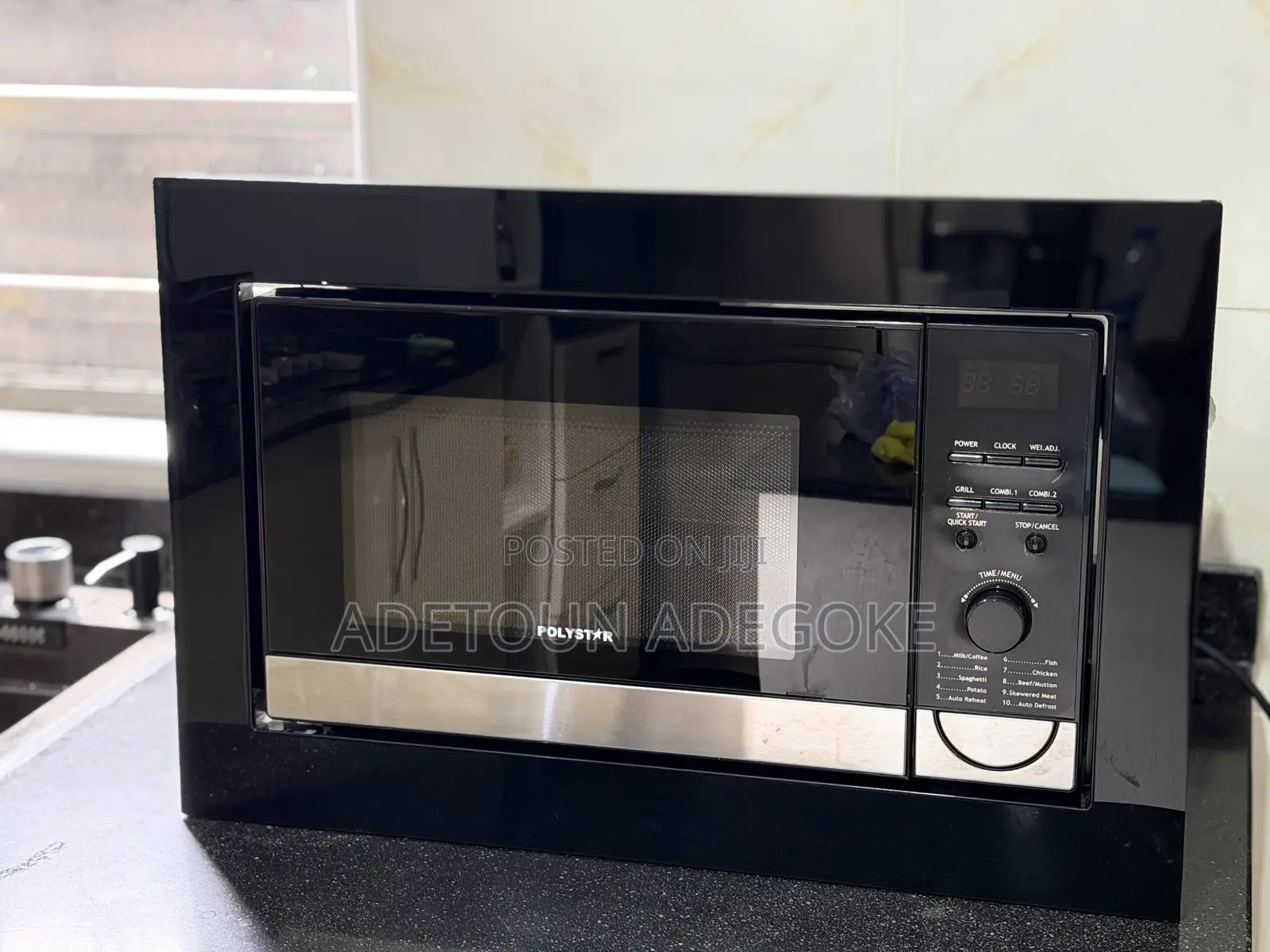 A Neatly Used Built in Microwave