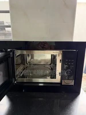 A Neatly Used Built in Microwave