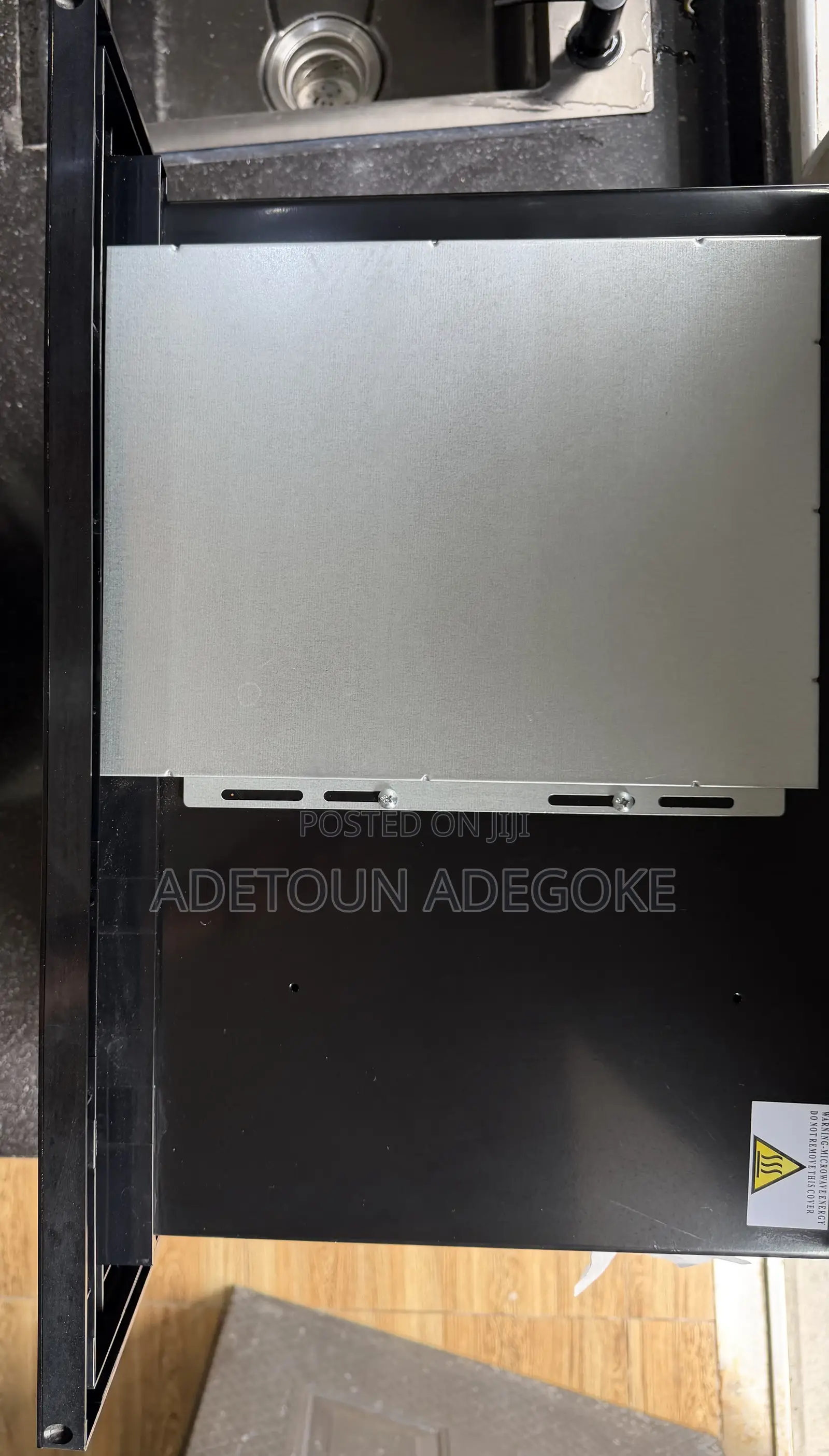 A Neatly Used Built in Microwave