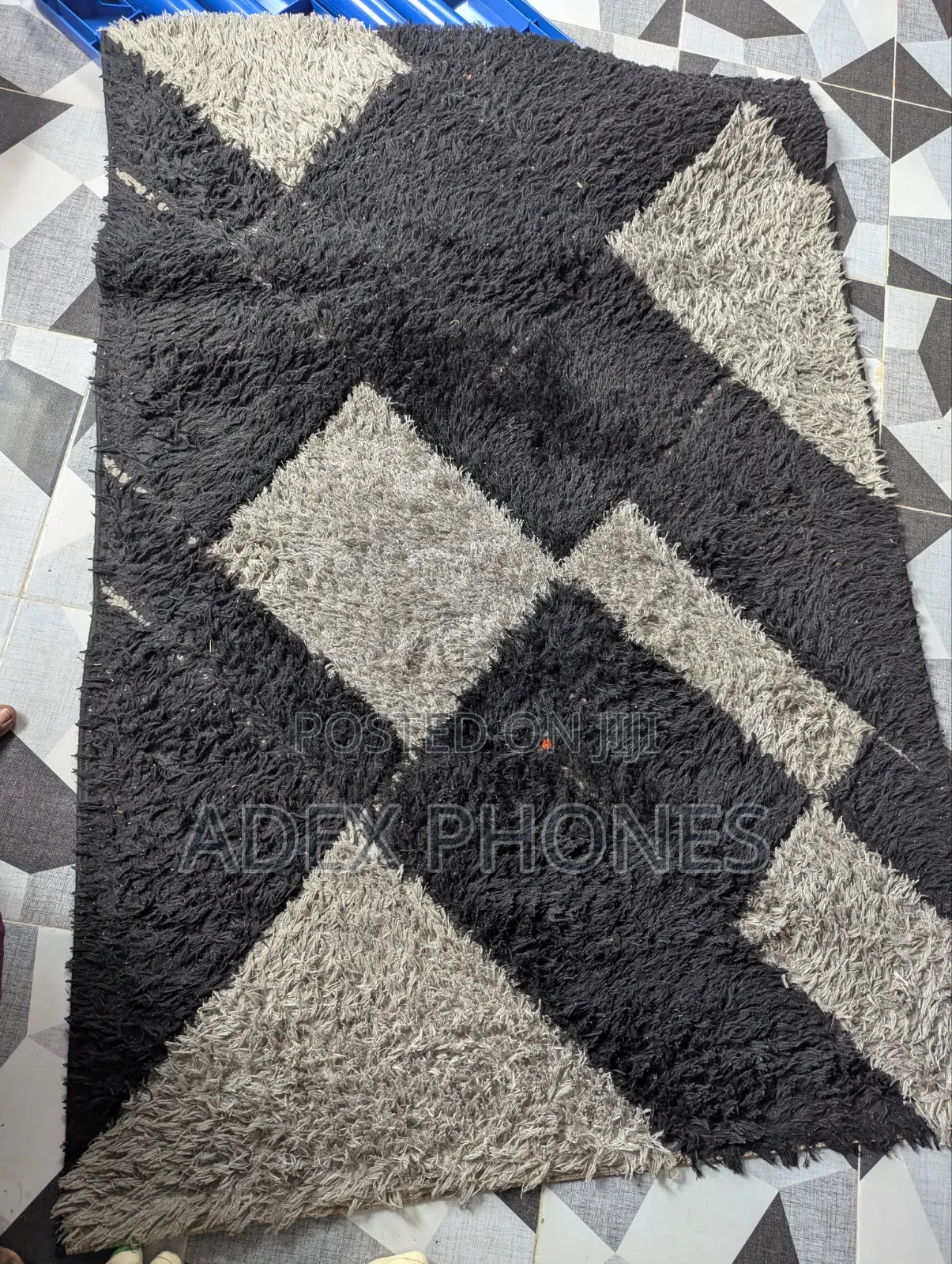 Few Weeks Old Center Rug.