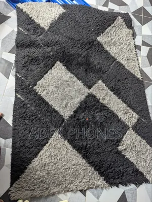 Few Weeks Old Center Rug.