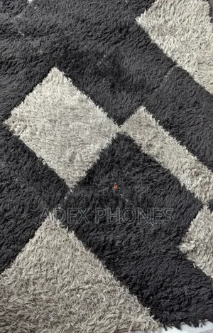 Few Weeks Old Center Rug.