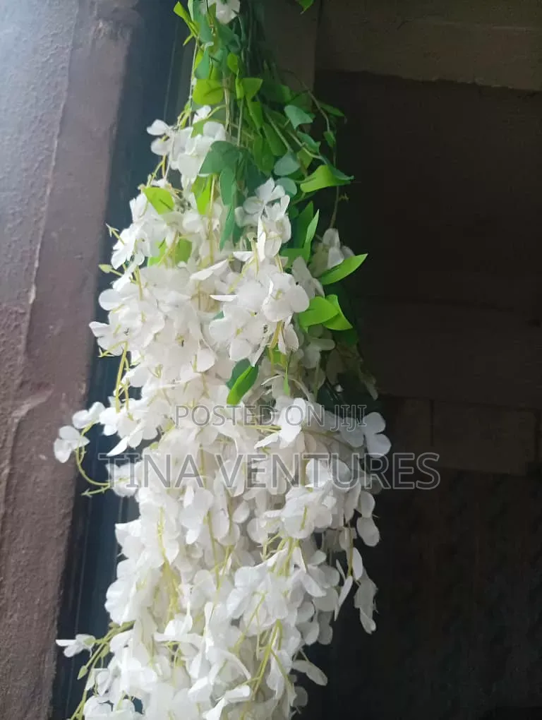 Artificial Dropping Flowers. Available in Different Colors.