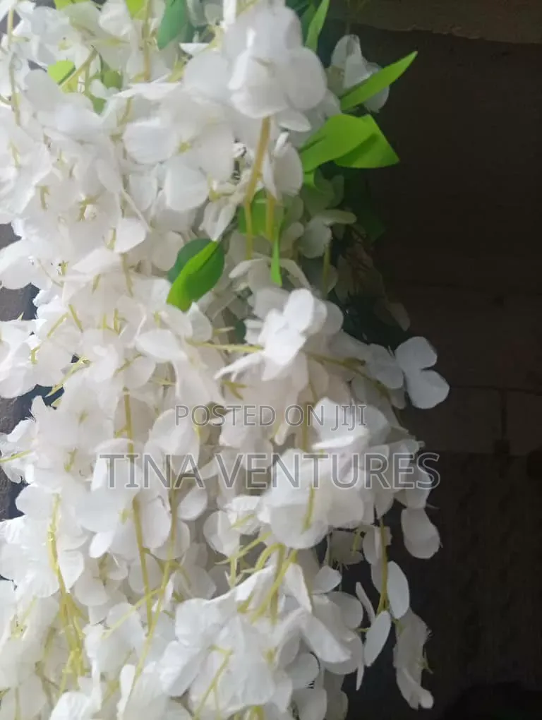 Artificial Dropping Flowers. Available in Different Colors.