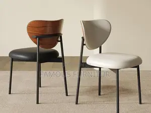 Modern Minimalist Dining Chairs Featuring Curved Wooden Backrests