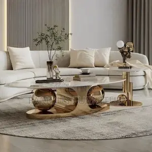 Modern Oval Coffee Table Featuring a Polished Marble-Patterned Top