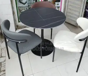 Modern Round Dining and Restaurant Set Featuring a Dark Faux-Marble