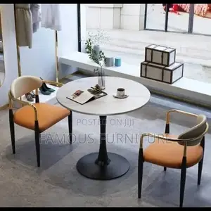 Modern Round Dining Set With a White Marble-Patterned Tabletop