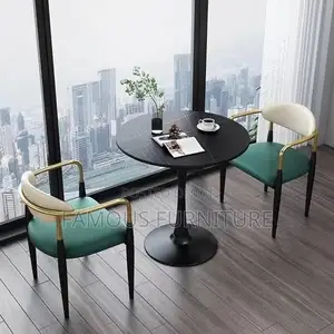 Modern Round Dining Set With a White Marble-Patterned Tabletop