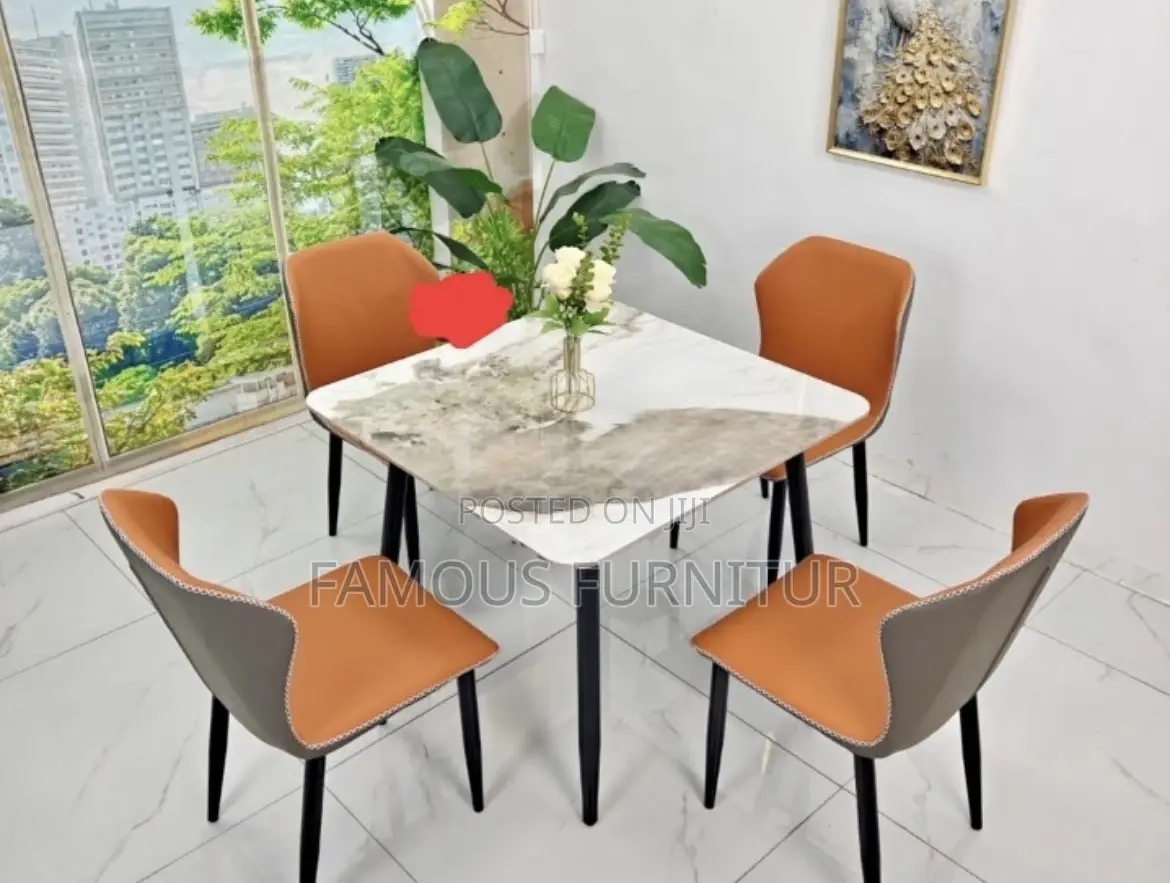Modern Round Dining Set With a White Marble-Patterned Tabletop