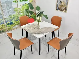 Modern Round Dining Set With a White Marble-Patterned Tabletop