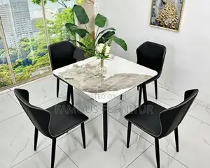 Modern Round Dining Set With a White Marble-Patterned Tabletop