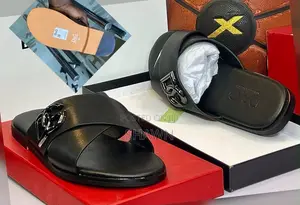 Dolce and Gabbana Leather Cross Slippers
