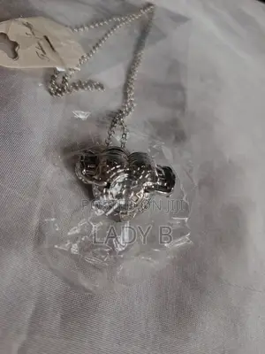 Silver Heart Shaped Vintage 4-Photo Folding Locket