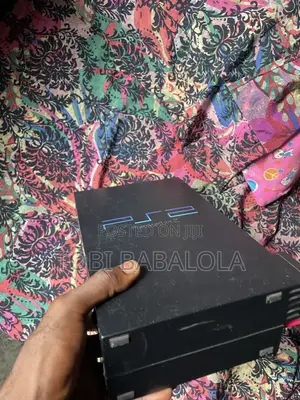 PS2 Console With 6 Games + 2 Controllers – Ready to Play