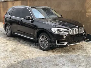 BMW X5 xDrive50i 4dr SUV AWD (4.4L 8cyl Turbo 8A) 2015 Brown