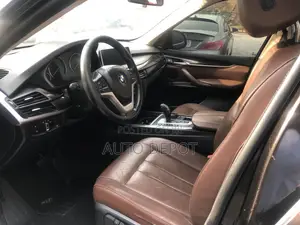 BMW X5 xDrive50i 4dr SUV AWD (4.4L 8cyl Turbo 8A) 2015 Brown