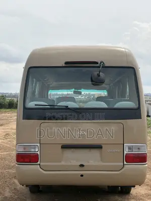 Toyota Coaster 2015 Brown