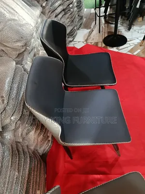 Modern Padded Leather Dining Chair Set With a High Curved Backrest