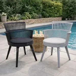 Modern Black Plastic Armchairs With Slatted Backrests and Cushioned