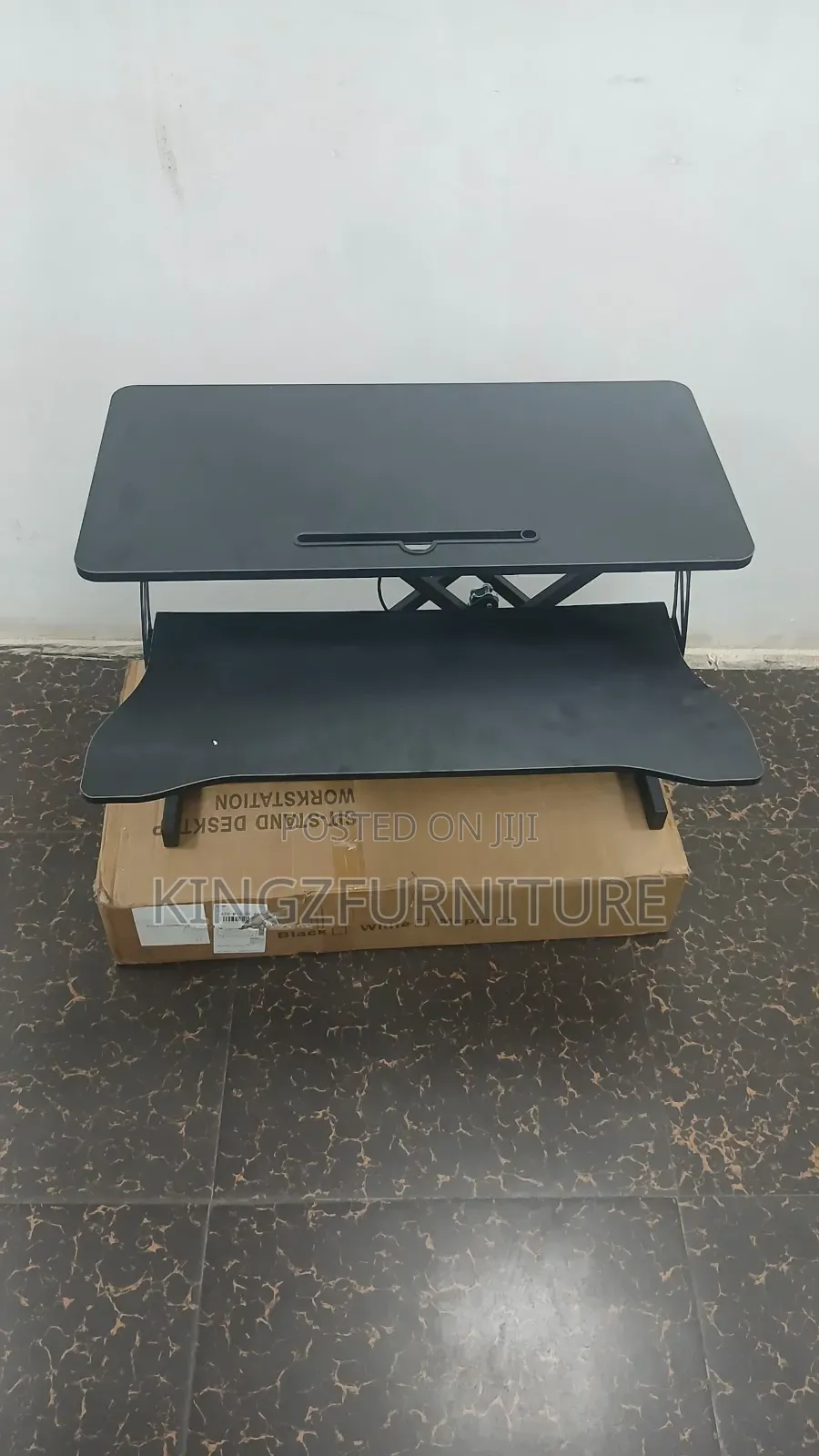 A 32-Inch Sit-Stand Desk Converter (Height-Adjustable Desktop Riser).