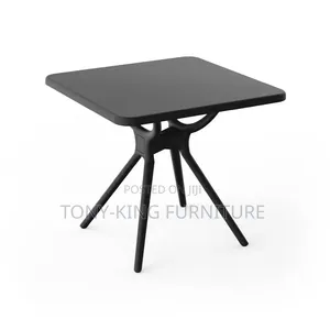 Black Square Restaurant Table With Angled Legs and a Smooth Top