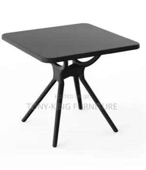 Black Square Restaurant Table With Angled Legs and a Smooth Top