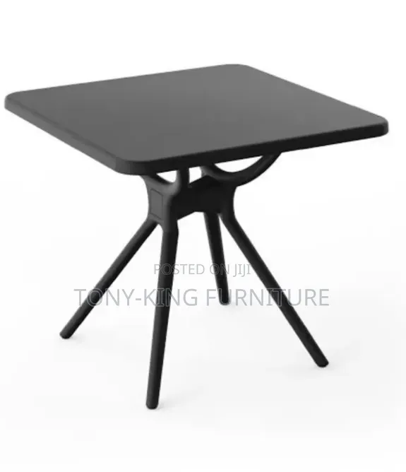 Black Square Restaurant Table With Angled Legs and a Smooth Top
