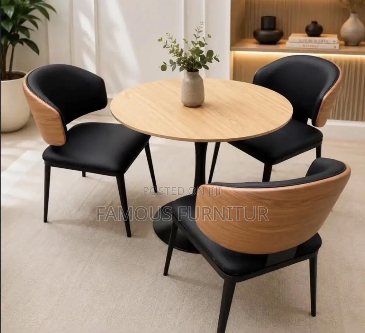 This Modern Three-Seater Dining Set Features a Round Light-Wood Table