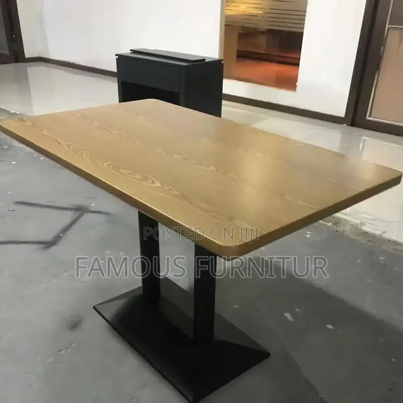 The Image Shows a Rectangular Restaurant or Café Table