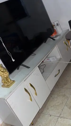 Neatly Used Off White TV Stand