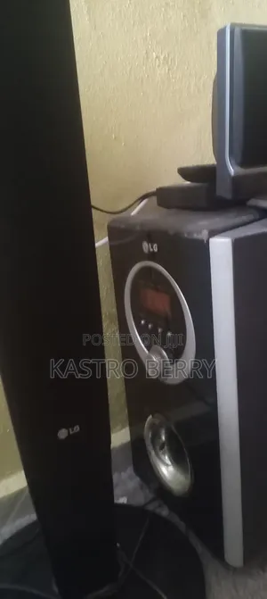 2 Standing Stick LG Speaking With a Sitting Speaking and a Woofer