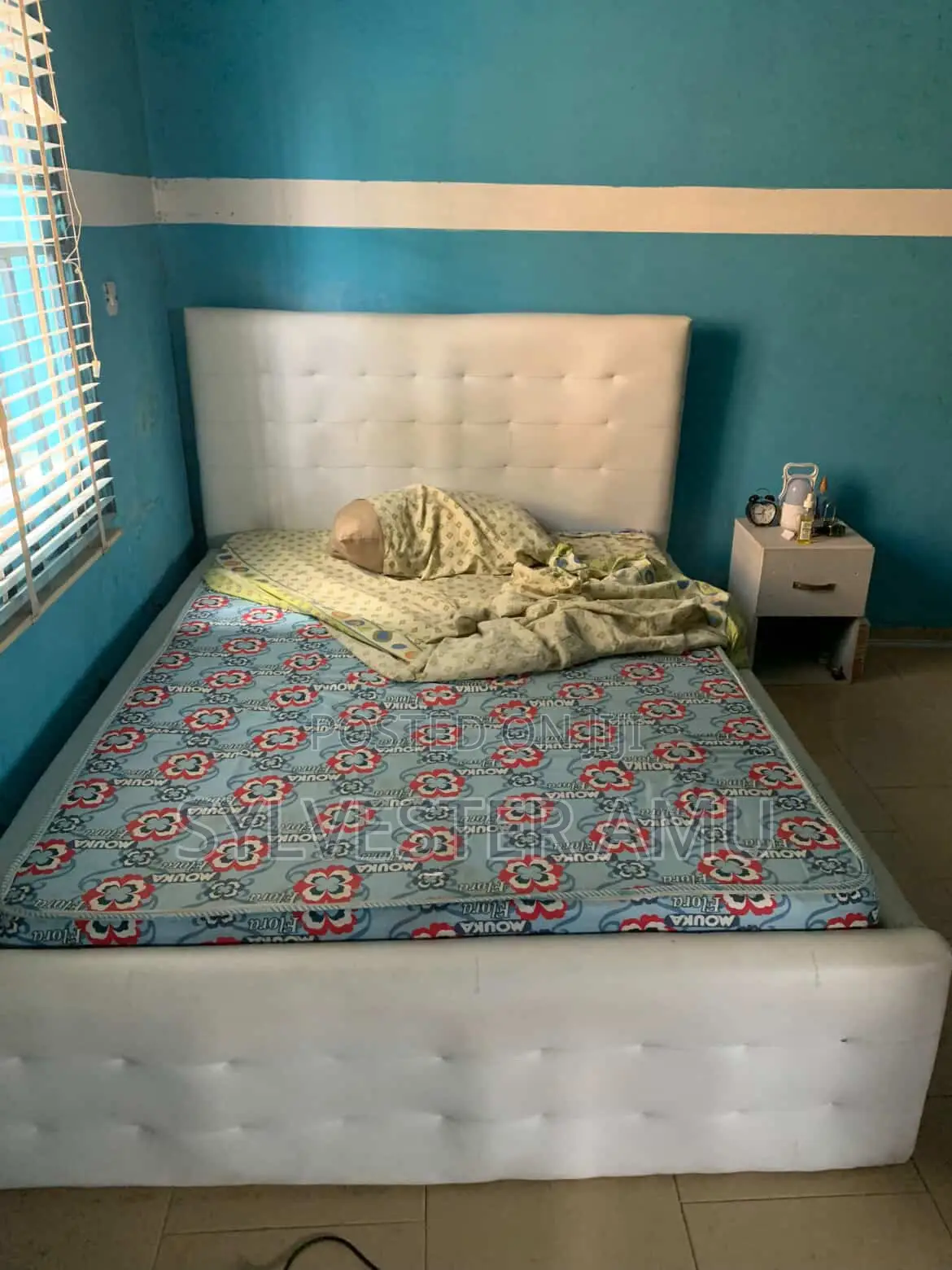 Few Months Used 4.5 by 6 Leather Bed Frame