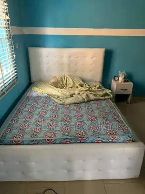 Few Months Used 4.5 by 6 Leather Bed Frame