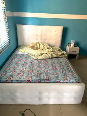 Few Months Used 4.5 by 6 Leather Bed Frame