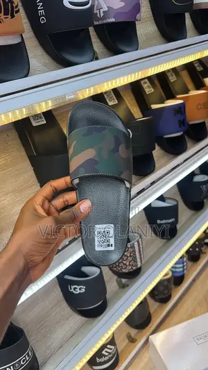Brand New Men’s Cartoon Palm Slippers – ₦20,000