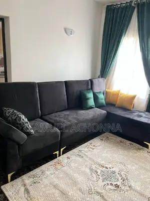 L-Shaped Sofa With Center Table