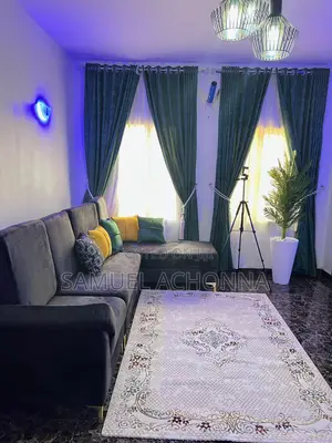 L-Shaped Sofa With Center Table