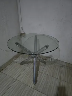 Glass Center Table and Glass Dining Table.