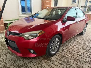 Toyota Corolla L 4dr Sedan (1.8L 4cyl 4A) 2014 Red